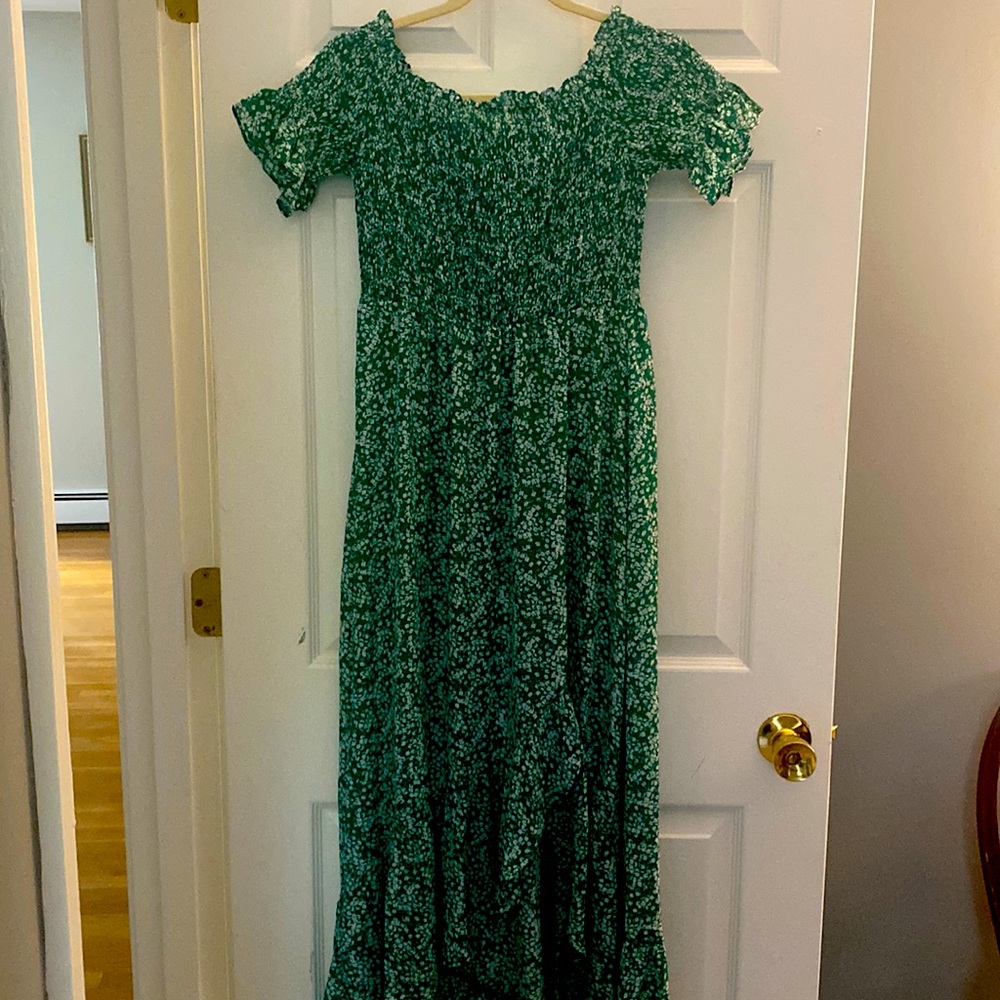Green and white floral midi dress.